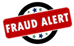 A red and white fraud alert sign on a black background.