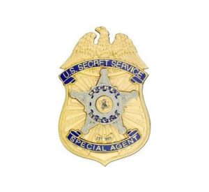 A badge with the words u s secret service special agent.