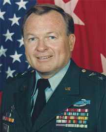 A man in a military uniform in front of an american flag.