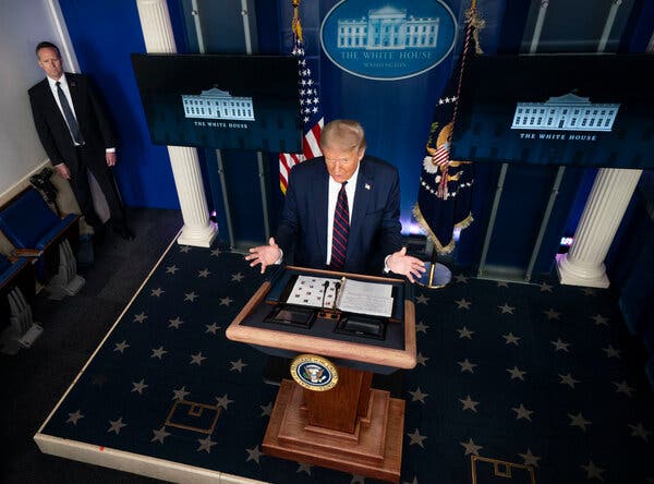 President donald trump speaks at a podium in the white house.