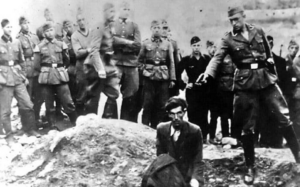A group of soldiers and a woman kneeling on the ground.