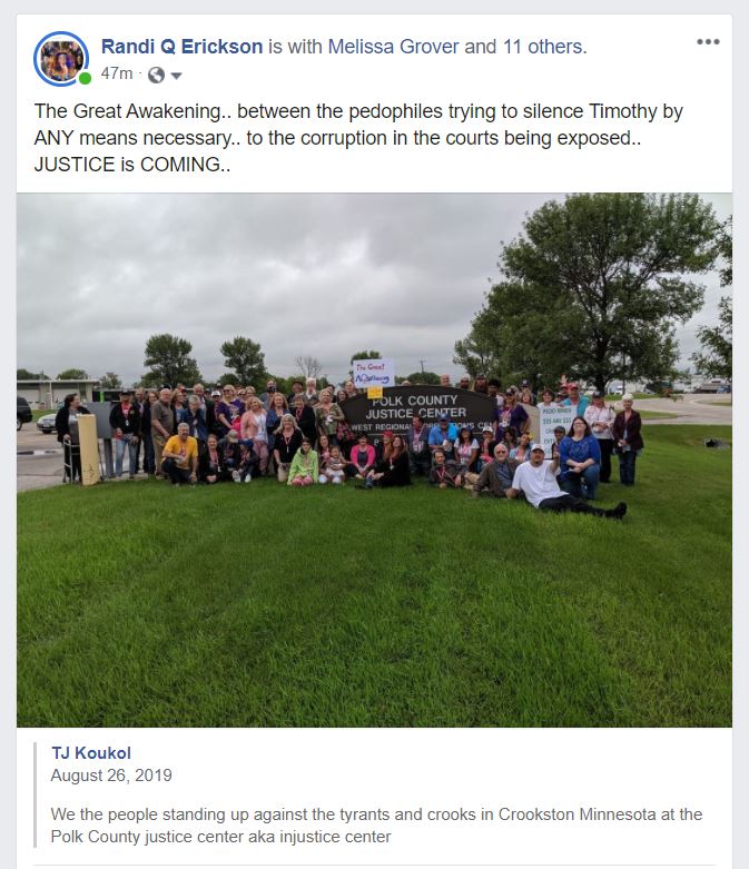 A photo of a group of people posing for a photo.