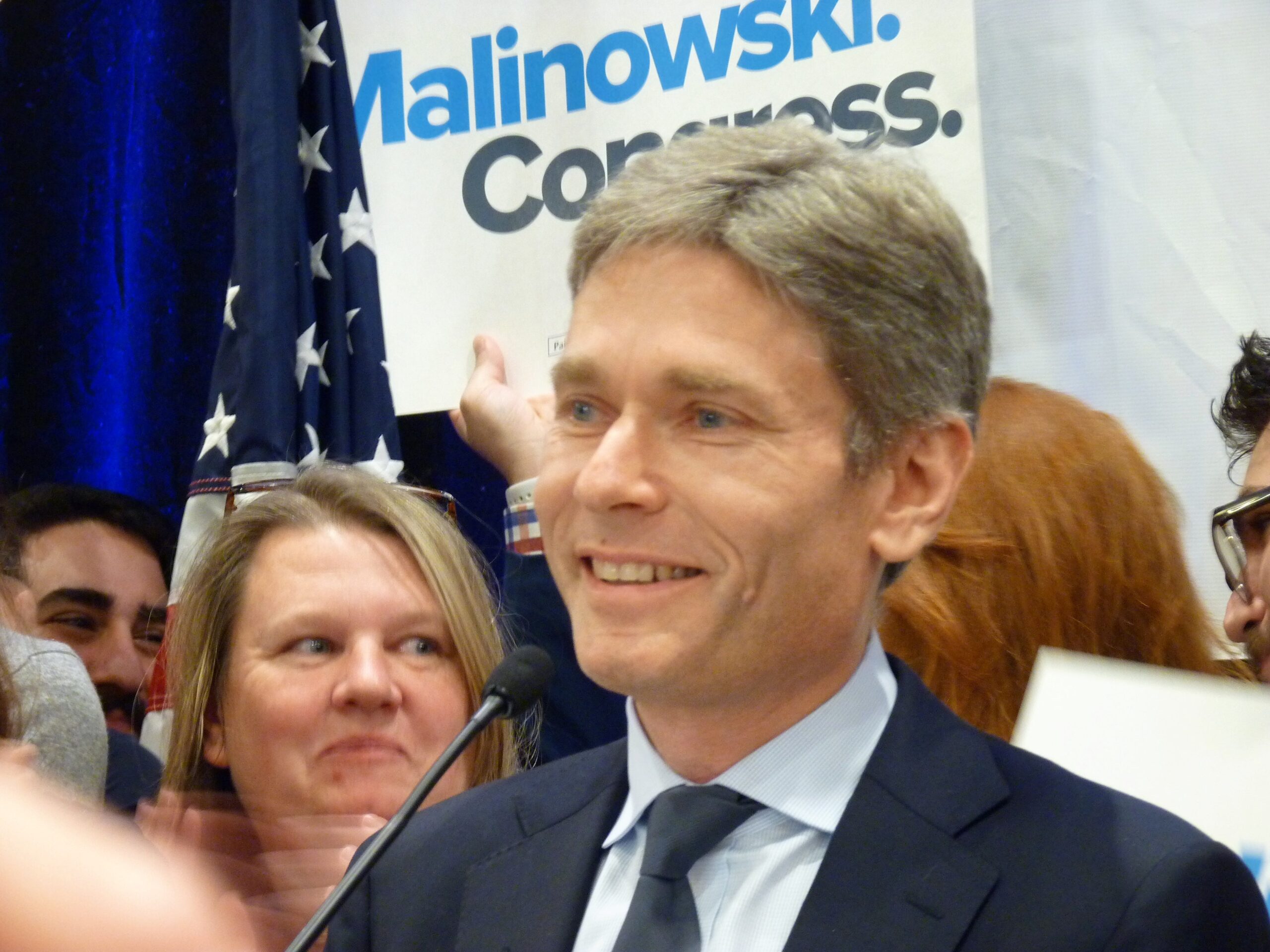 A man wearing a suit and tie.