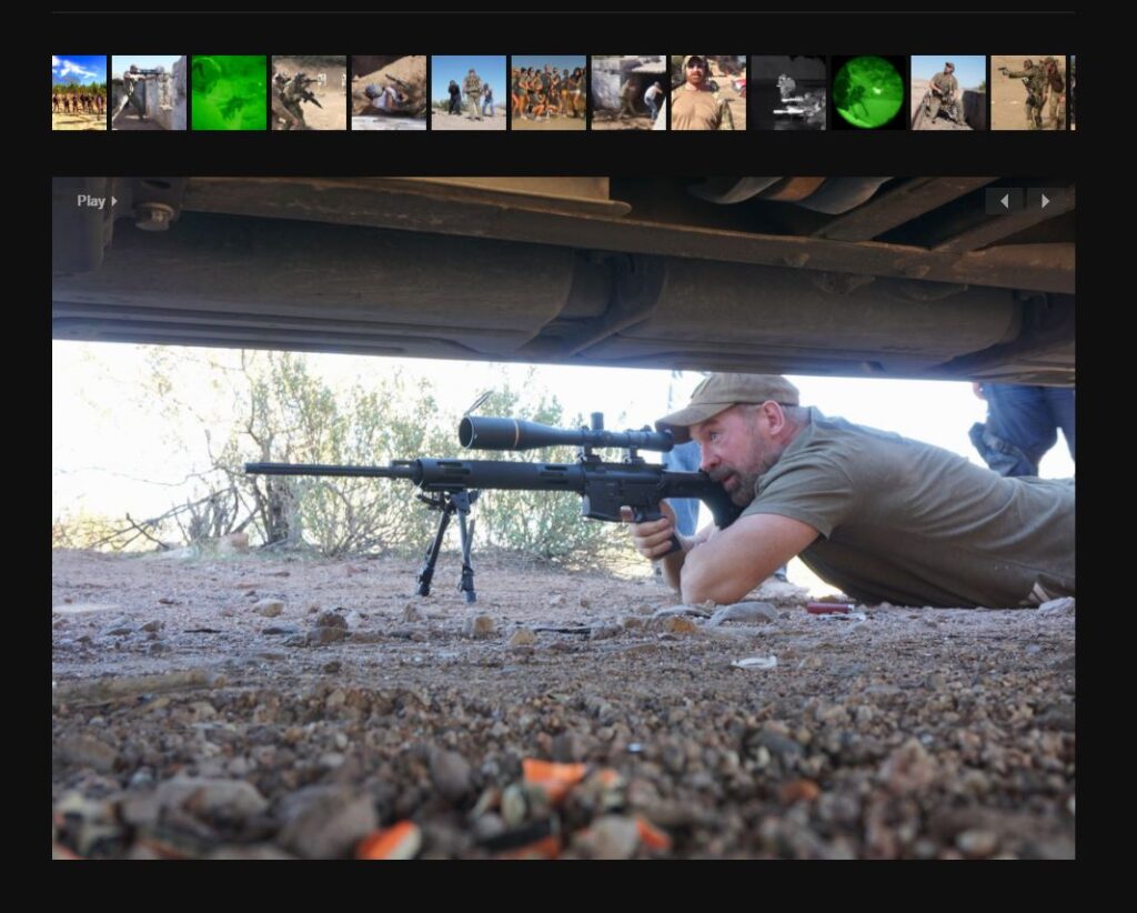 man in prone position wielding a sniper rifle