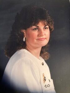 old photo of a curly haired woman