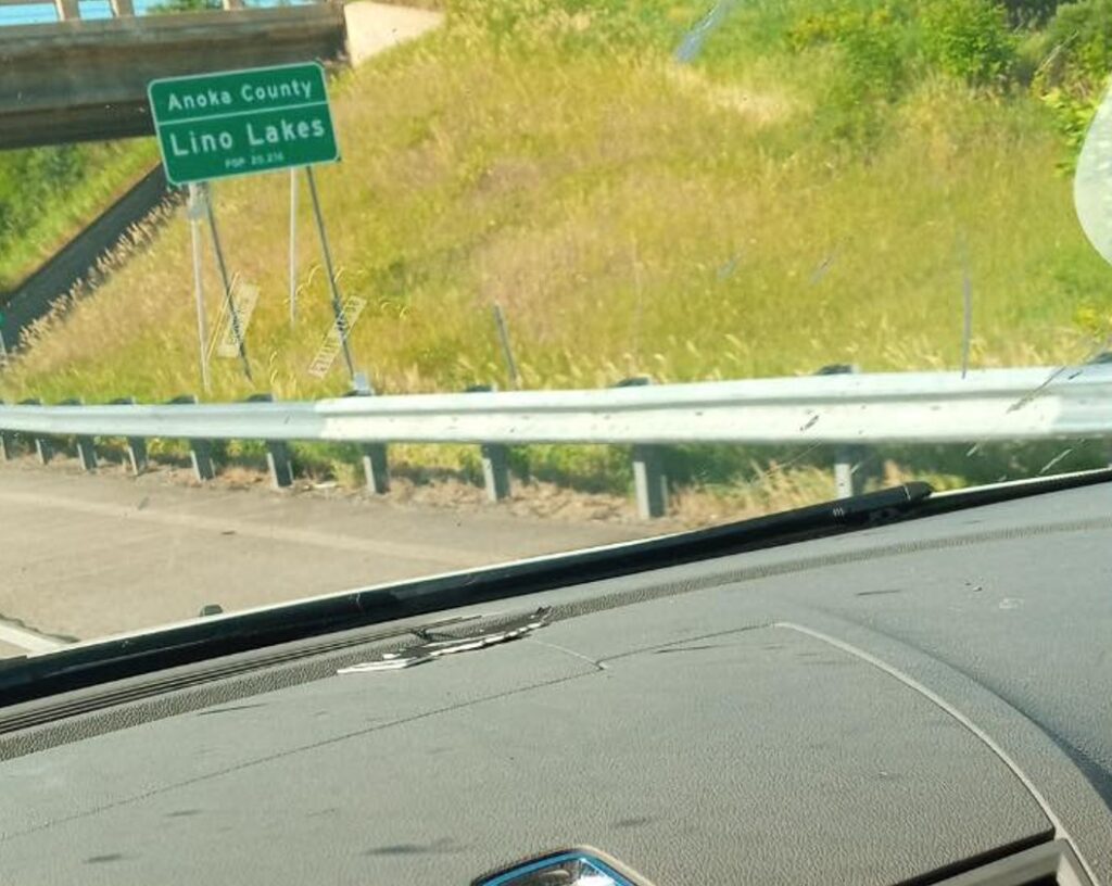 photo of the road from the inside of a car