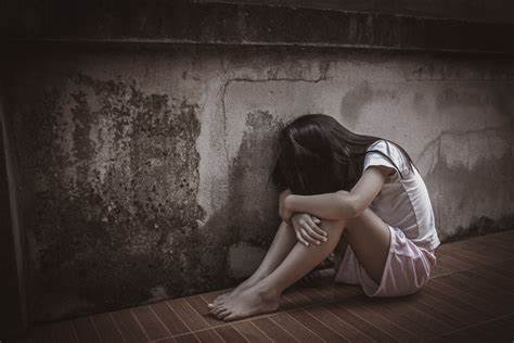 A child sitting on the floor