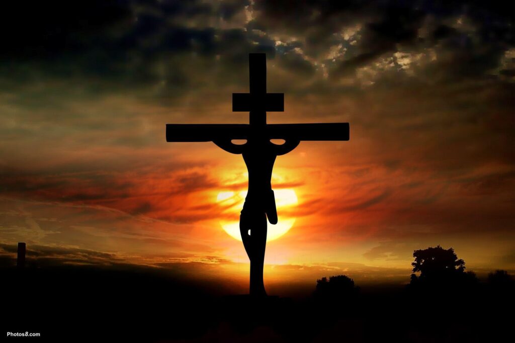 A silhouette of a crucifix