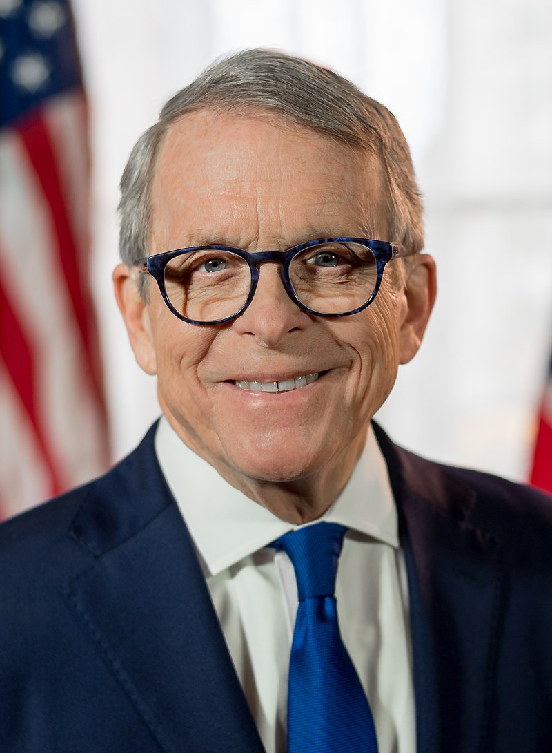 man wearing a blue tie