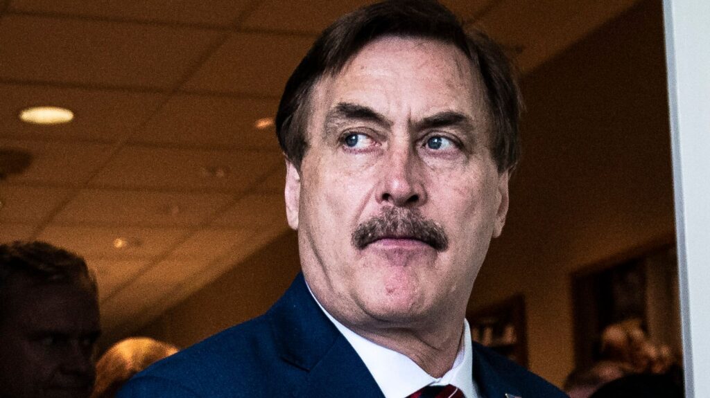 Mike Lindell, Former Navy Seal, Standing in Suit