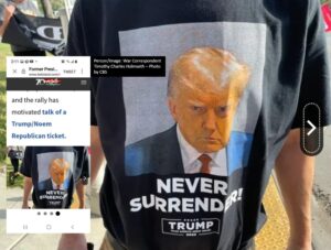 A man wearing a t-shirt that says never surrender trump.