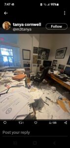 Taylor cornwell's office with a lot of papers.
